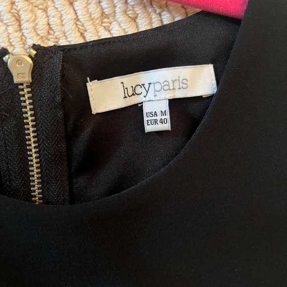 Black blouse with feathered bottom - Picture 2 of 2